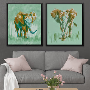 a living room with two paintings of elephants on the wall