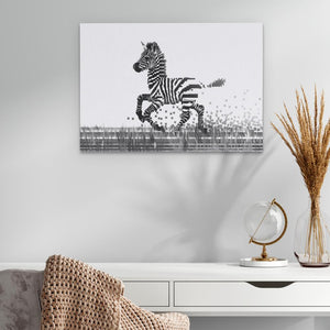 a picture of a zebra running across a field