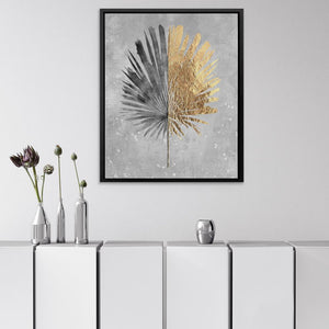 a picture of a flower on a wall above a cabinet