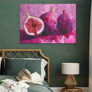 a painting of two pomegranates on a green wall above a bed