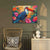a painting of a toucan sitting on a wall next to a chair