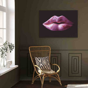 a painting of a woman's lips on a wall