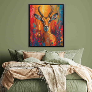 a painting of a deer on a green wall above a bed