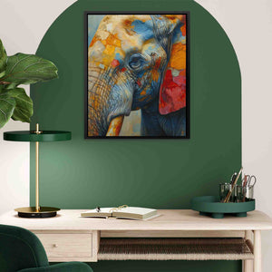 a painting of an elephant on a green wall
