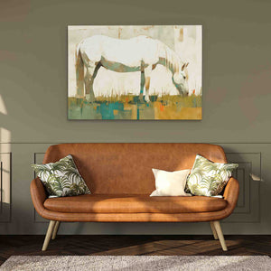 a painting of a horse on a wall above a couch