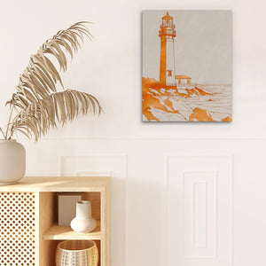 a picture of a lighthouse on a wall next to a potted plant