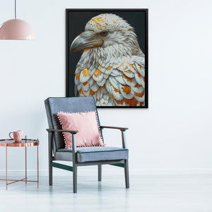 a painting of a bird on a wall above a chair