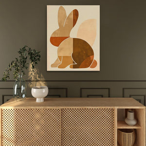 a picture of a rabbit on a wall above a cabinet