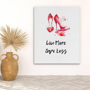 a painting of a pair of high heeled shoes with the words live more bare