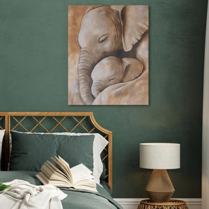 a painting of a baby elephant and its mother on a wall above a bed