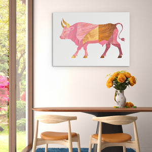 a painting of a bull on a wall above a table