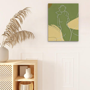 a white vase sitting on top of a wooden shelf