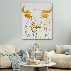 a living room with a cow painting on the wall