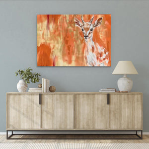 a painting of a deer on a wall above a sideboard