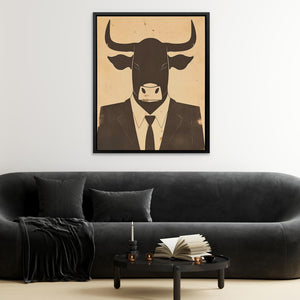 a living room with a black couch and a cow head on the wall