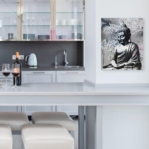 a kitchen with a white counter top and a painting on the wall