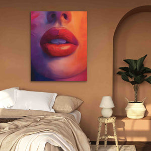 a painting of a woman's lips on a wall above a bed