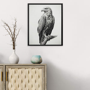 a black and white photo of an eagle sitting on a branch