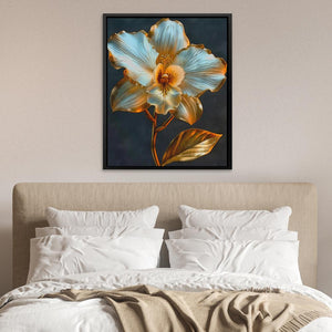 a picture of a flower on a wall above a bed