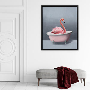 a pink bathtub with a pink flamingo in it