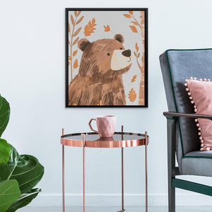 a picture of a bear on a wall above a table