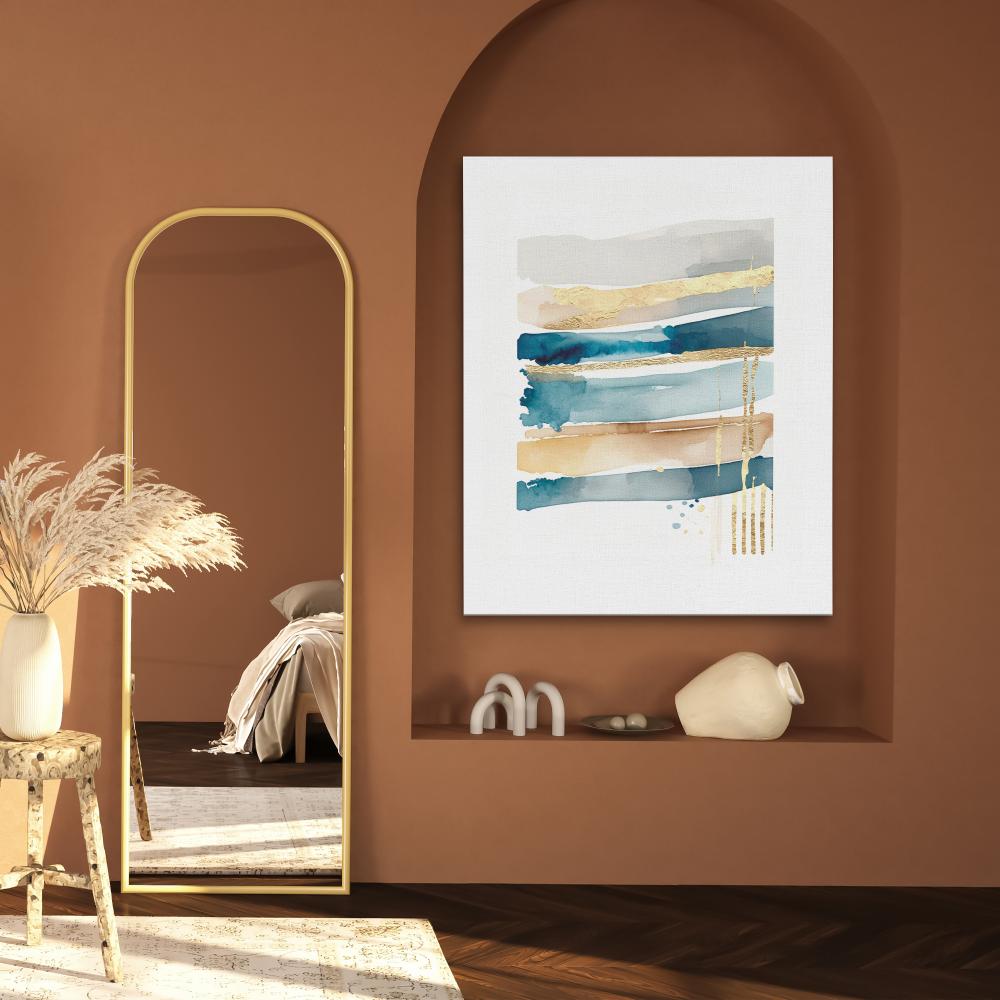 a painting on a white wall with blue and gold paint