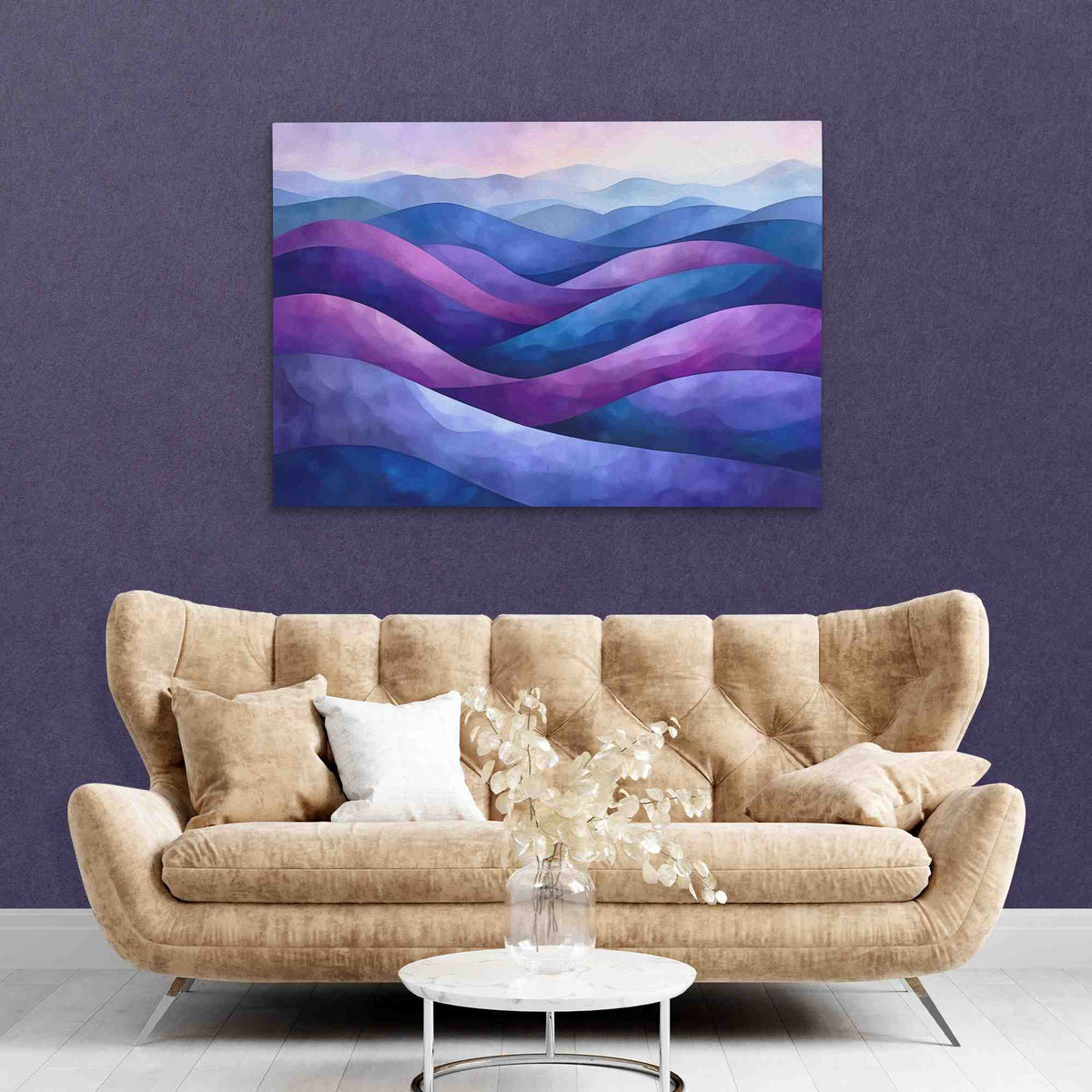 a living room with a couch and a painting on the wall