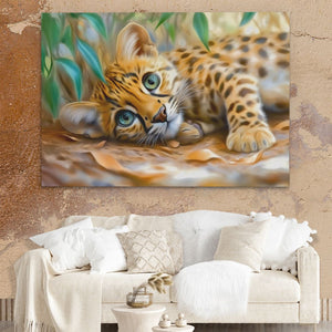 a painting of a baby leopard laying on the ground