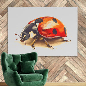 a painting of a lady bug on a wall