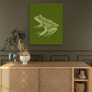 a picture of a frog on a green background