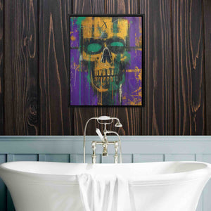 a bathroom with a skull painting on the wall
