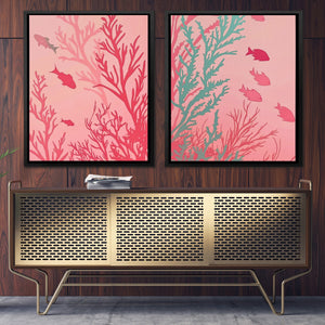 two paintings of fish and corals on a wall