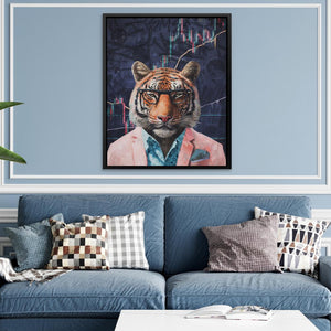 a living room with a blue couch and a painting of a tiger