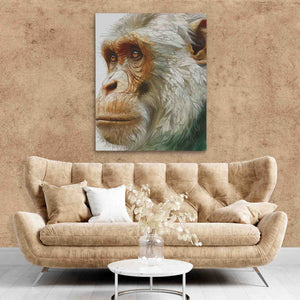 a living room with a couch and a painting of a monkey