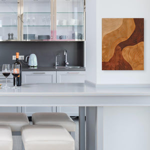 a kitchen with a white counter top and white chairs