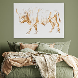 a picture of a bull on a wall above a bed