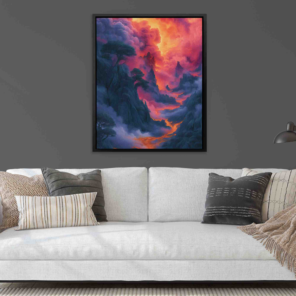 a living room with a couch and a painting on the wall