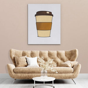 a living room with a couch and a coffee cup on the wall