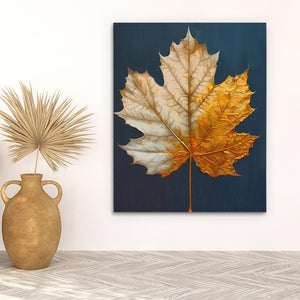 a painting of a leaf on a wall next to a vase