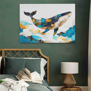 a painting of a whale on a wall above a bed