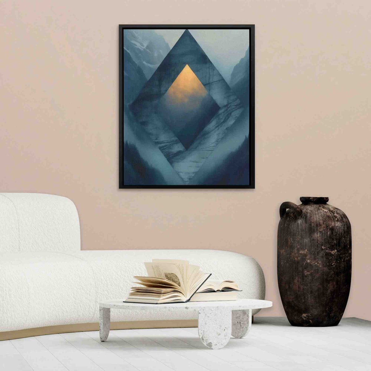 a living room with a white couch and a painting on the wall