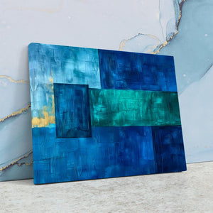 a painting of blue and green squares on a wall