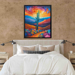 a painting of a cactus on a wall above a bed