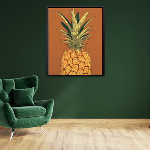 a painting of a pineapple on a green wall