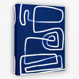 a blue and white abstract painting on a wall