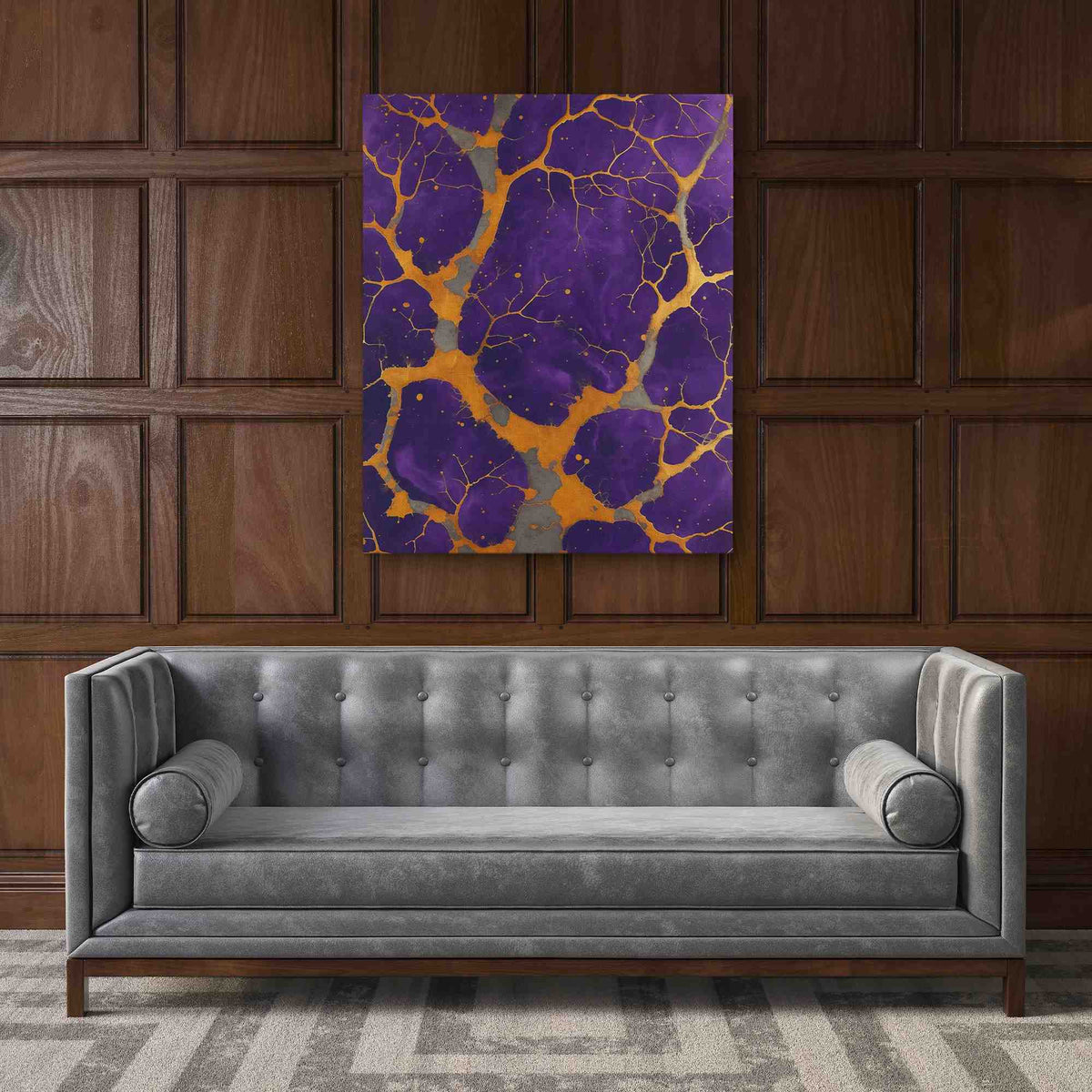 a living room with a couch and a painting on the wall