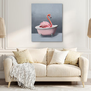 a pink bath tub with a pink flamingo in it