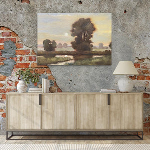 a painting hanging on a brick wall next to a sideboard