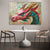 a painting of a dragon on a wall above a table