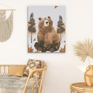 a painting of a brown bear on a white wall